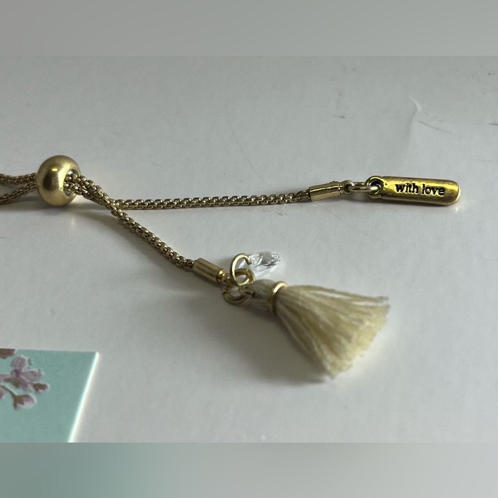 Lonna & Lilly Gold-Tone White Flower Slider Bracelet - Picture 5 of 6